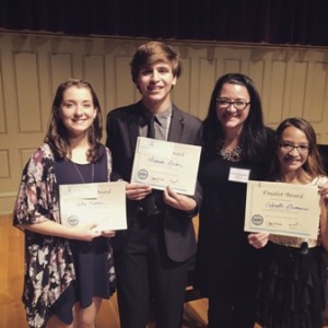 Vocal teacher Julie Krugman (third from left) is joined by her students who were finalists at the Boston chapter of the National Association of Teachers of Singing auditions held Nov. 14 and 16: (l to r) Alex Gardner, senior at Westborough High School; Alex Gardner of Webster, sophomore at Worcester State University; and Gabrielle Guimaraes, home schooled seventh-grader of Westborough. Photo/submitted 