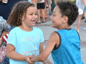 Olivia Read and Michael Meehan, both 7, dance to music played by The Reminisants. Photos/Ed Karvoski Jr.