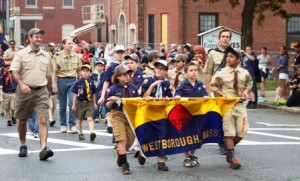 Local Cub Scouts march in the parade. 