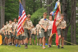 Members of Westborough Boy Scout Troop 100’s Color Guard present the colors at a dedication for a new archery pavilion named in honor of the late Greg Montalbano.  