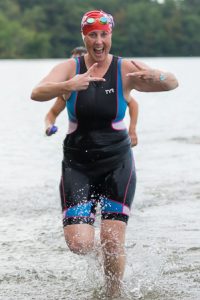 Lisa Keary of Framingham exits the water after the swimming portion of the triathlon. 