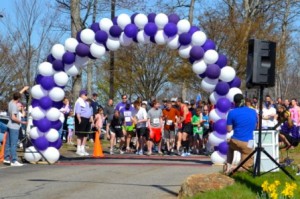 Runners cross the finish line at the 2014 Walk/Run for Pancreatic Cancer. (Photos/submitted)