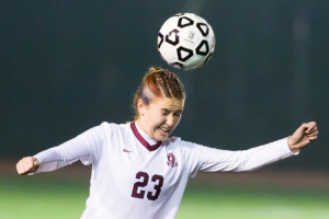 – Westborough’s Claire Hounslow reacts as she heads the ball in the Central Division 1 Semi-Final against Wachusett.