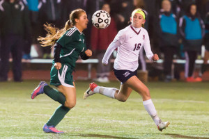 Westborough’s Madeline French (#16) and Wachusett’s Victoria Steffon (#3) race to the ball.