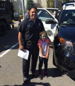 Auburn Police Officer Bryan Porcaro and  5-year-old Renée Monaghan of Westborough. Photo/submitted