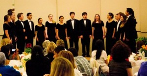The WHS Chamber Singers perform an arrangement of songs in various languages at the Spring Dinner Concert.