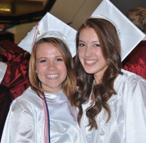 Erin McCarthy and Alli Raissipour wait together in the lobby for the ceremony to begin.