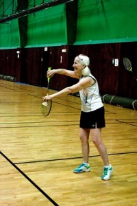Beth Sopka, president of the Massachusetts Badminton Association, prepared to serve at the Massachusetts Senior Games badminton competition.