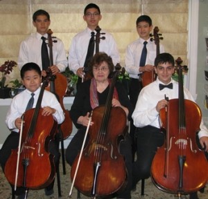 Soloists performing with Maryan Pietropaolo's 2014 Festival Orchestra: (back row, l to r) Max Polich (Grade 9, Westborough High School), Kevin Lai (Grade 11, Westborough High School), and Michael Barbini (Grade 8, Sarah W. Gibbons Middle School); (front row, l to r) Thomas Zhang (Grade 5, Mill Pond School), Maryan Pietropaolo, and Derin Iscan (Grade 6, Mill Pond School)