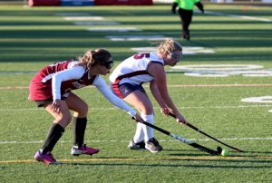 Lindsey Bromm (right) maneuvers around a Fitchburg defender.