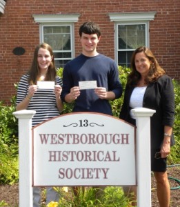 Westborough Historical Society President Cary Mulrain (right) presents scholarships to Molly Burke and Doug Casey. Photo/submitted