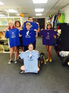 Teen participants with the t-shirts they created at Cre8 studio.