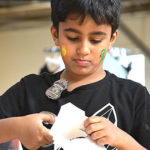 Aarush Dondapati, 8, creates a craft. Photo/Ed Karvoski Jr.