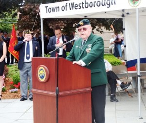 Denzil Drewry welcomes participants, guests and residents to the ceremony in front of the Forbes Municipal Building. 