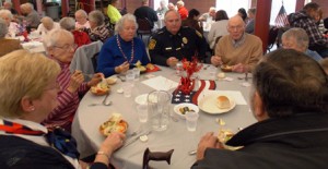 Westborough Police Chief Alan Gordon with residents at the Veteran’s Day luncheon.