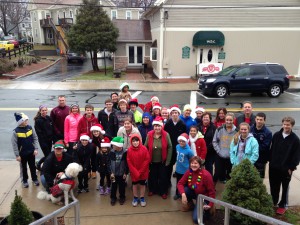 About 35 church members get ready to participate in the fourth annual Jingle Bell Run at Saint Luke’s Church. 