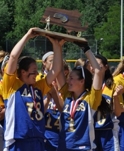 Morgan Parmeter and Brittany Lutz hold up their newly won trophy.