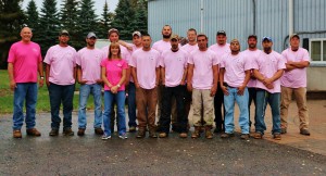 The entire McCarthy's company is wearing pink this October including owner Roger McCarthy (far left) and his wife, Sue (in front).  Photo/submitted