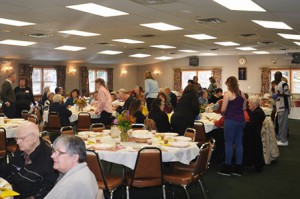 Guests at last year's dinner enjoy a Thanksgiving dinner at the Knights of Columbus Council 85 hall in Westborough.  Photo/  Knights of Columbus Council 85 